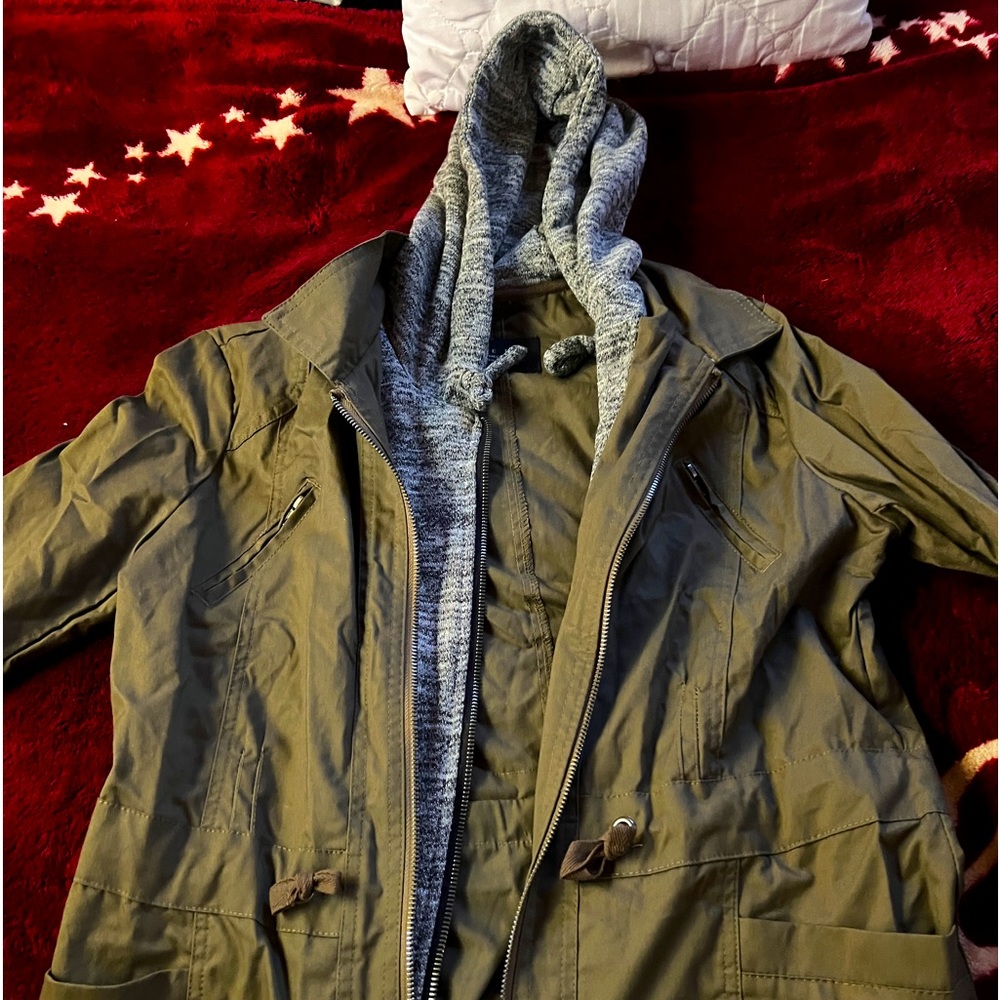 I am selling a dark green cinched waist utility jacket.